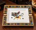 Equestrian decorative ashtray with patterned border and gold-tone accents