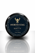 North Stag Natty Beard & Hair Pomade black tin, navy and gold circular label, 2 oz / 56 g