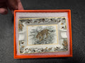 Small decorative tiger ashtray with intricate jungle wildlife pattern and gold-tone trim